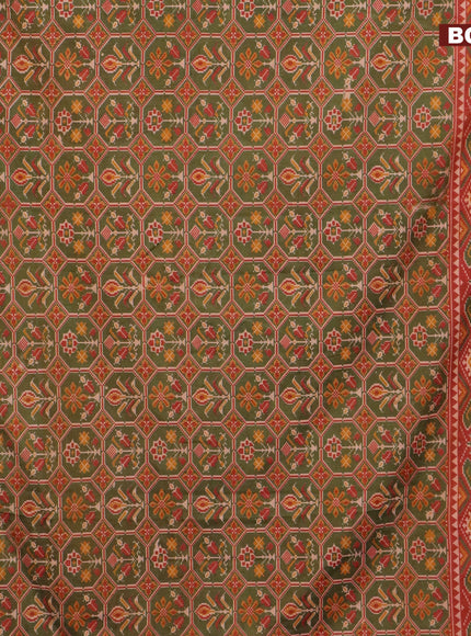 Semi tussar saree sap green and rust shade with allover ikat prints and zari woven border