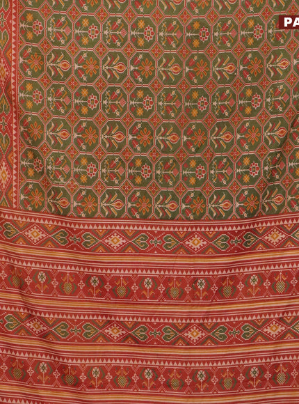 Semi tussar saree sap green and rust shade with allover ikat prints and zari woven border