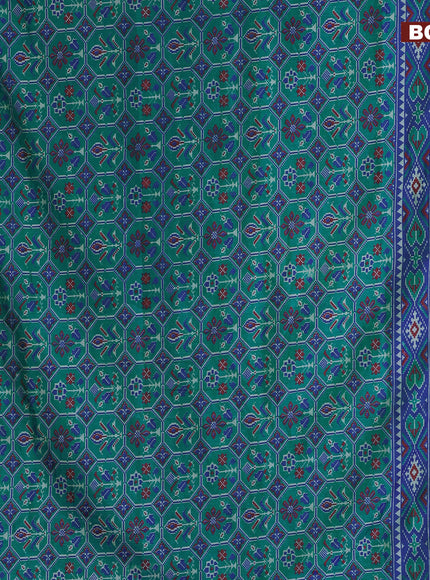 Semi tussar saree teal bluish green and blue with allover ikat prints and zari woven border