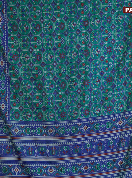 Semi tussar saree teal bluish green and blue with allover ikat prints and zari woven border