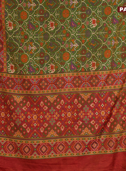 Semi tussar saree dual shade of green and dual shade of rust with allover ikat prints and zari woven border