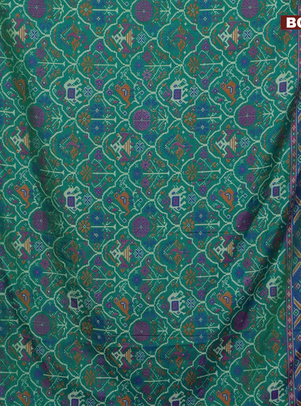 Semi tussar saree dual shade of green and dual shade of teal blue with allover ikat prints and zari woven border