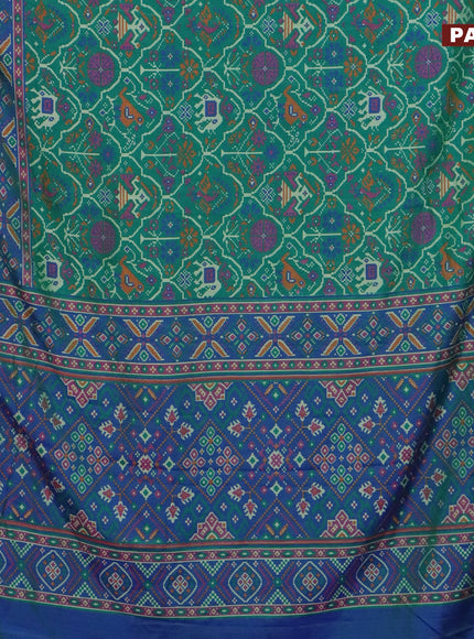 Semi tussar saree dual shade of green and dual shade of teal blue with allover ikat prints and zari woven border