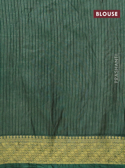 Semi tussar saree dual shade of teal blue and green with allover ikat prints and zari woven border