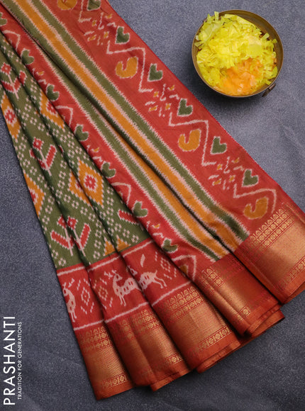 Semi tussar saree green and rust shade with allover ikat prints and zari woven border