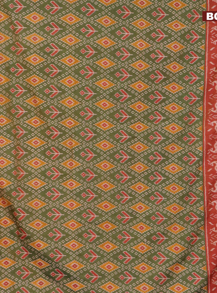 Semi tussar saree green and rust shade with allover ikat prints and zari woven border