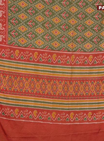 Semi tussar saree green and rust shade with allover ikat prints and zari woven border