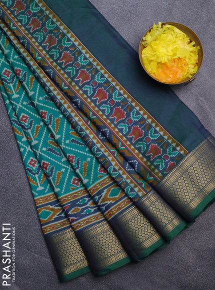 Semi tussar saree dual shade of teal blue and dual shade of blue with allover ikat prints and zari woven border