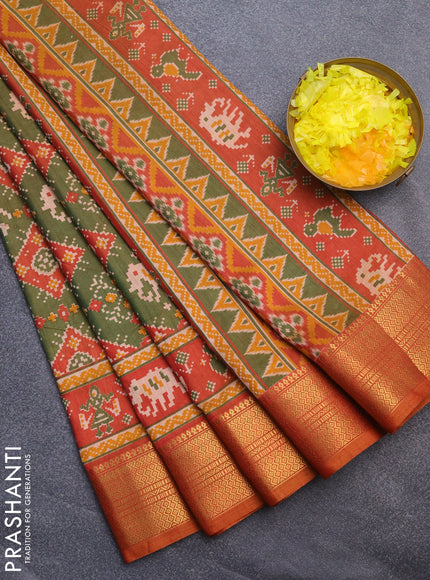 Semi tussar saree dual shade of green and dual shade of rust with allover ikat prints and zari woven border