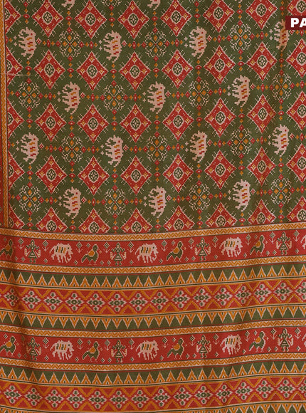 Semi tussar saree dual shade of green and dual shade of rust with allover ikat prints and zari woven border