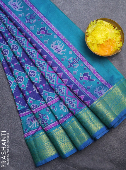 Semi tussar saree blue and teal blue with allover ikat prints and zari woven border