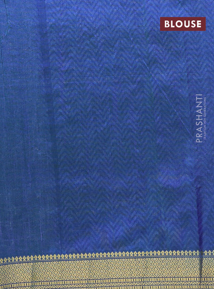 Semi tussar saree dual shade of teal blue and blue with allover ikat prints and zari woven border