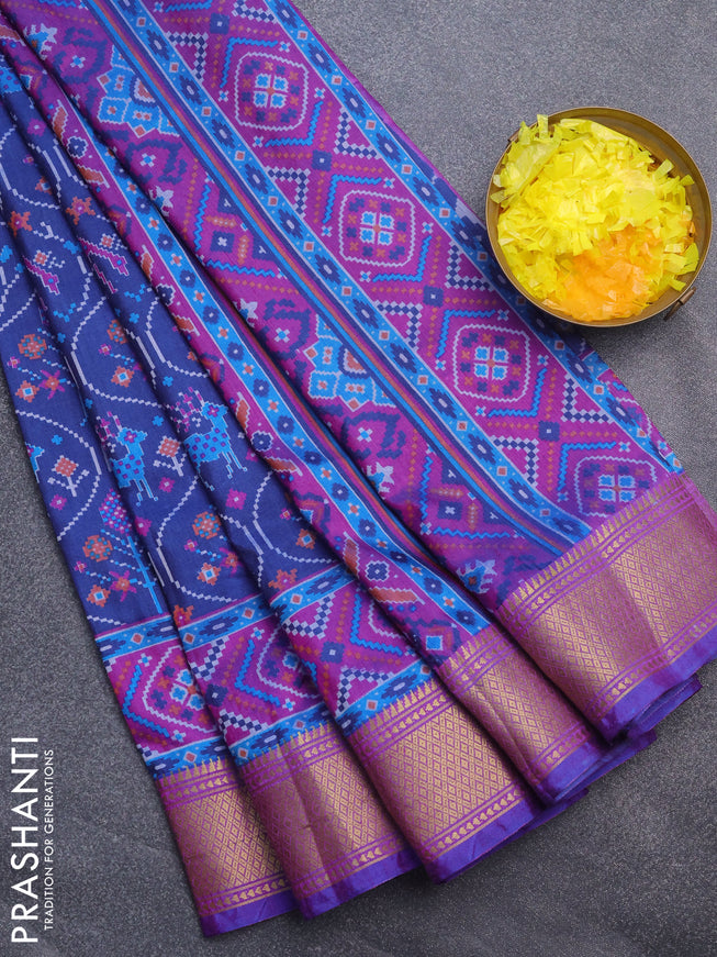 Semi tussar saree blue and purple with allover ikat prints and zari woven border