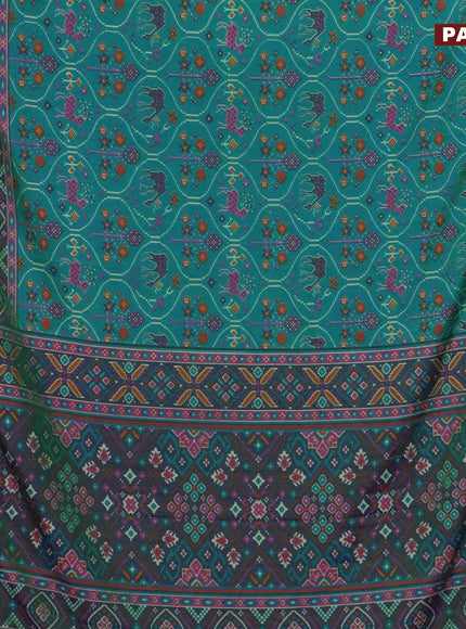 Semi tussar saree dual shade of teal blue and dual shade of violet with allover ikat prints and zari woven border