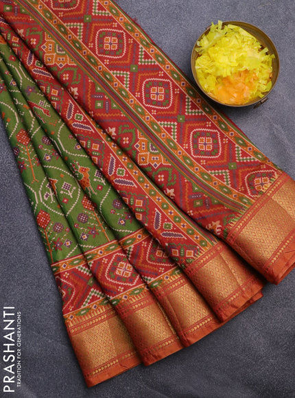 Semi tussar saree dual shade of green and dual shade of rust with allover ikat prints and zari woven border