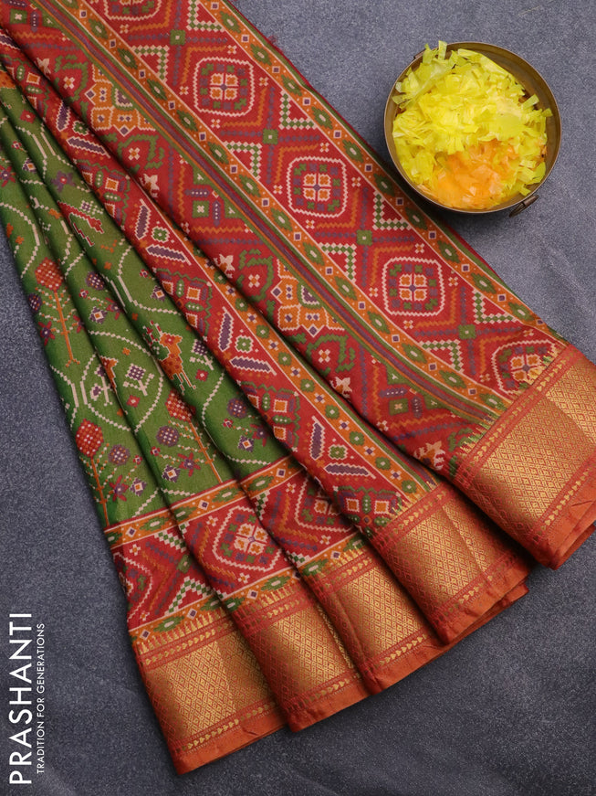 Semi tussar saree dual shade of green and dual shade of rust with allover ikat prints and zari woven border