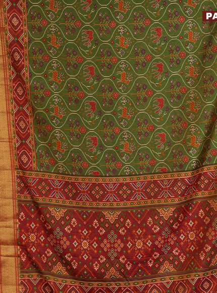 Semi tussar saree dual shade of green and dual shade of rust with allover ikat prints and zari woven border