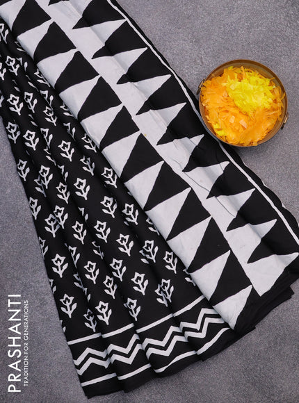 Modal partly silk saree black with butta prints and printed border