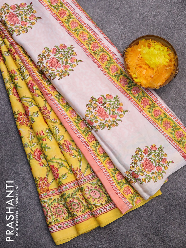 Modal silk saree yellow with allover kalamkari prints and printed border