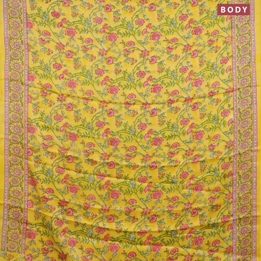 Modal silk saree yellow with allover kalamkari prints and printed border