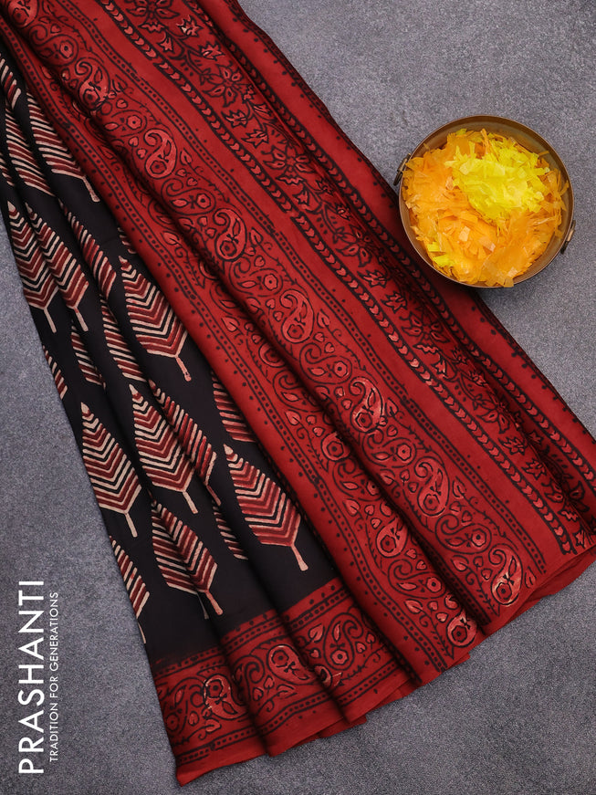 Modal silk saree black and maroon with leaf butta prints and printed border