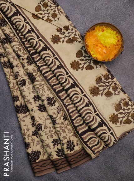 Modal silk saree sandal and brown with allover prints and printed border