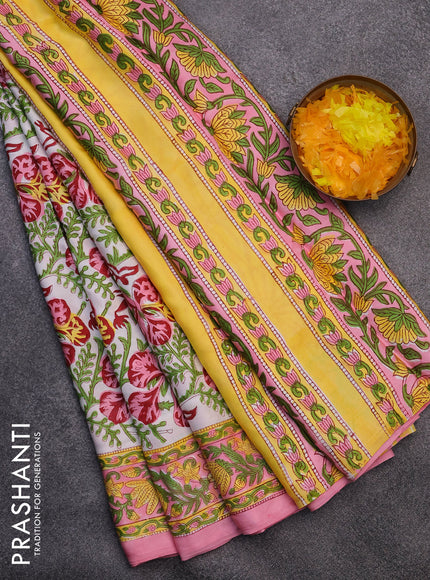 Modal silk saree off white and peach pink with allover kalamkari prints and printed border