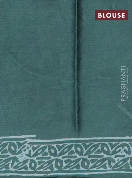 Modal silk saree green shade with geometric prints and printed border