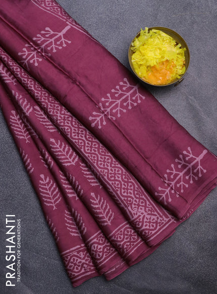 Modal silk saree maroon shade with allover leaf butta prints and printed border