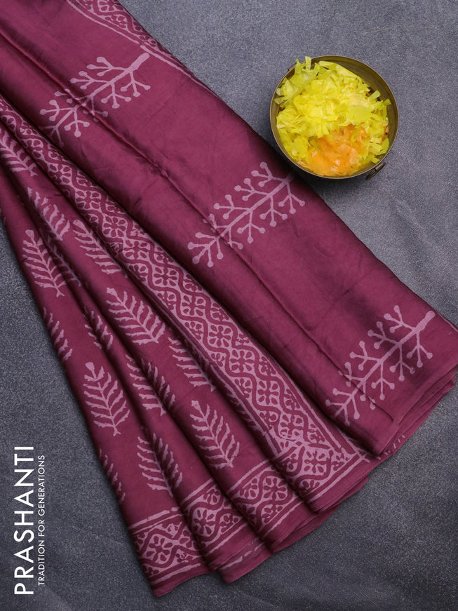 Modal silk saree maroon shade with allover leaf butta prints and printed border