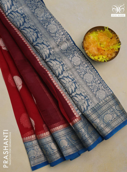 Banarasi organza silk saree red and cs blue with thread & zari woven buttas and woven border