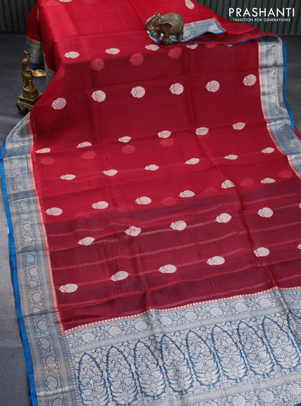 Banarasi organza silk saree red and cs blue with thread & zari woven buttas and woven border