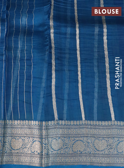 Banarasi organza silk saree red and cs blue with thread & zari woven buttas and woven border