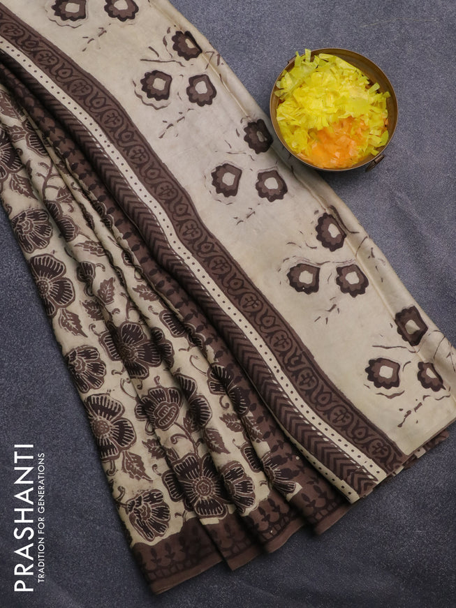 Modal silk saree cream and brown with allover kalamkari prints and printed border