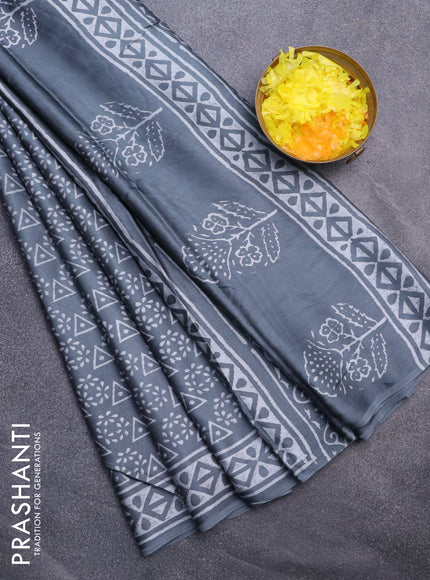 Modal silk saree grey with allover prints and printed border