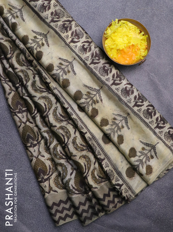 Modal silk saree greyish green with allover prints and printed border