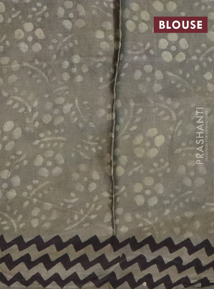 Modal silk saree greyish green with allover prints and printed border