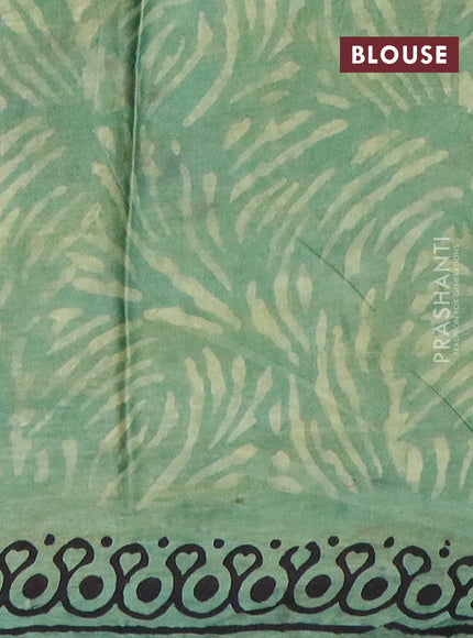 Modal silk saree green shade with allover kalamkari prints and printed border