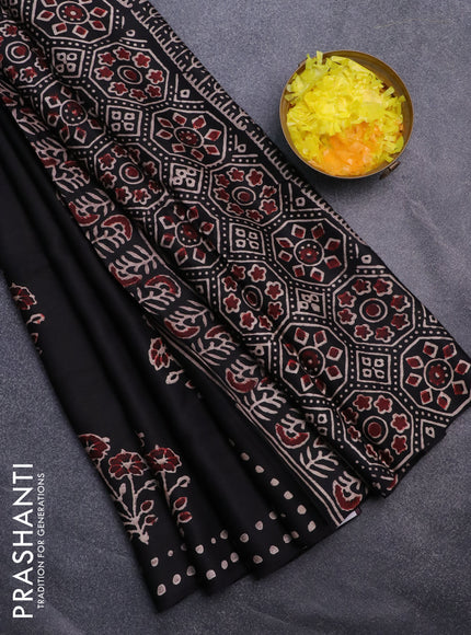 Modal silk saree black with allover floral butta prints and simple border