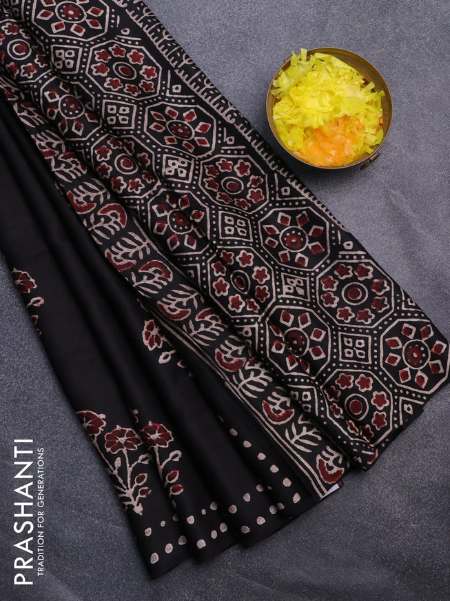 Modal silk saree black with allover floral butta prints and simple border