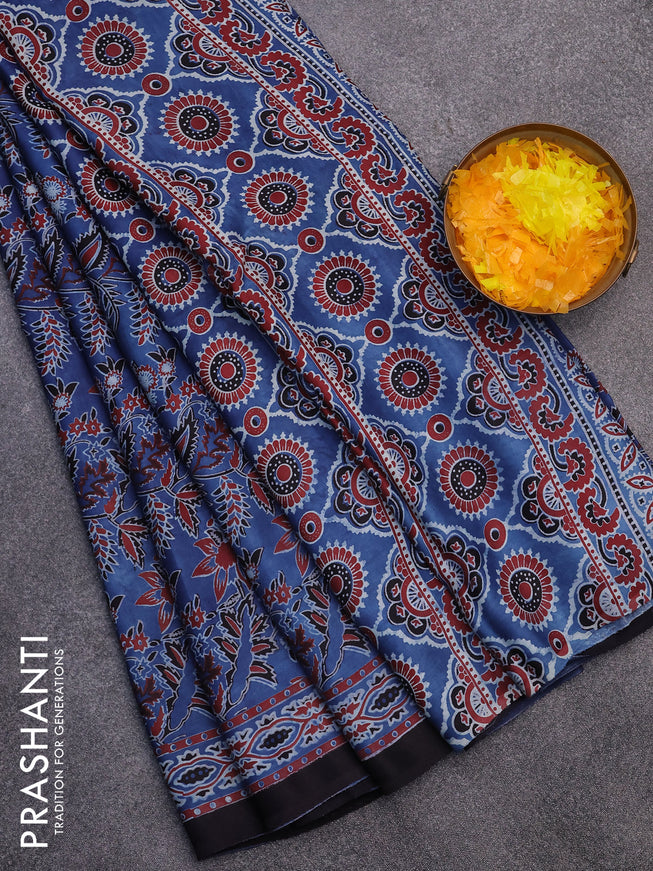 Modal silk saree blue and black with allover kalamkari prints and printed border