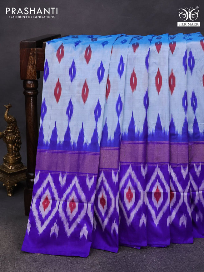 Pochampally silk saree pastel blue and royal blue with ikat butta weaves and zari woven ikat style border