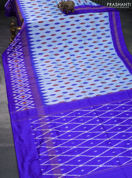 Pochampally silk saree pastel blue and royal blue with ikat butta weaves and zari woven ikat style border