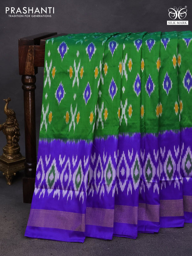 Pochampally silk saree green and blue with ikat butta weaves and ikat style zari woven border