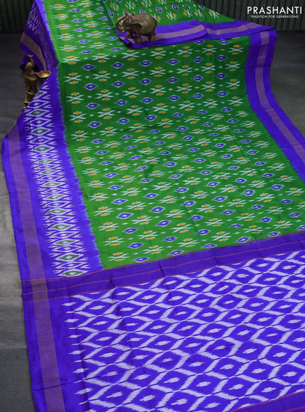 Pochampally silk saree green and blue with ikat butta weaves and ikat style zari woven border