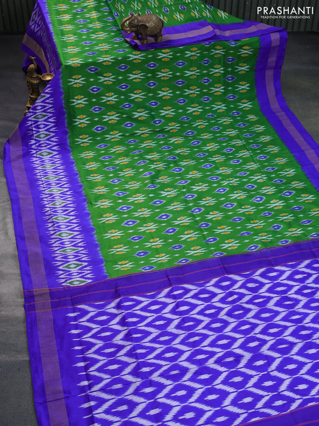 Pochampally silk saree green and blue with ikat butta weaves and ikat style zari woven border