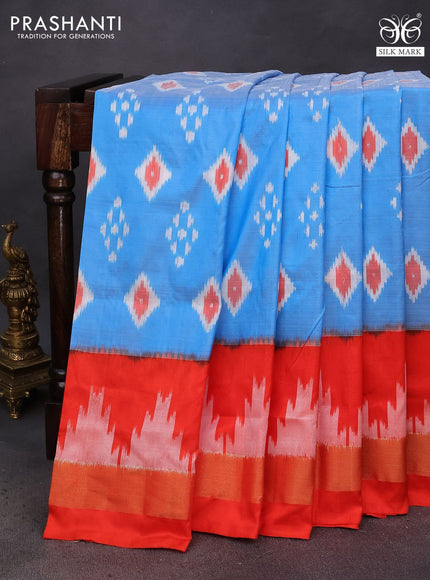 Pochampally silk saree light blue and orange with ikat butta weaves and ikat style zari woven border