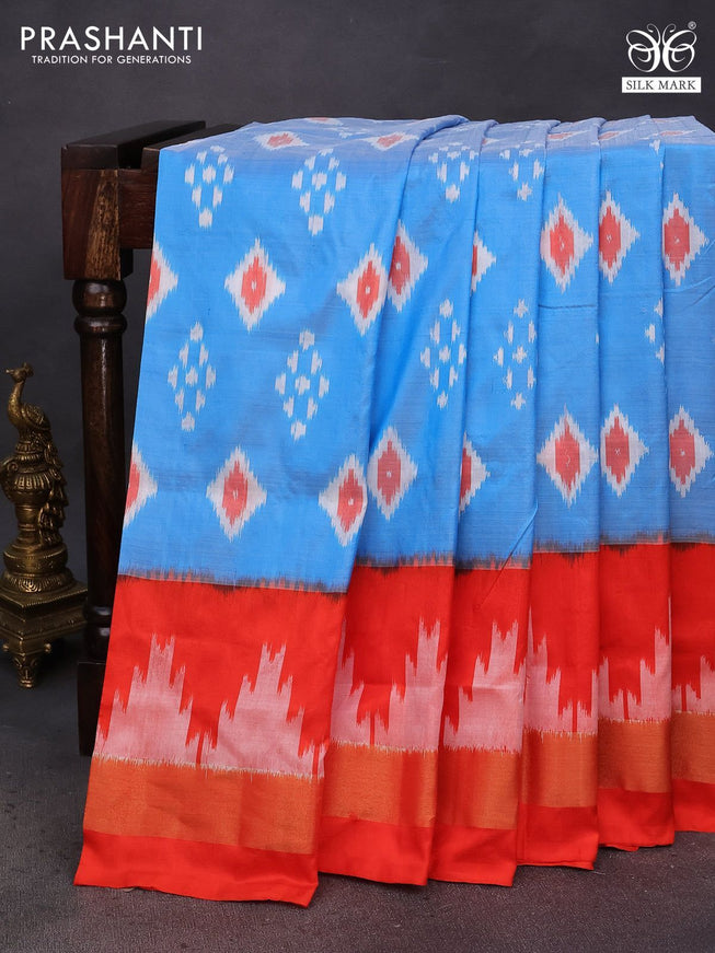 Pochampally silk saree light blue and orange with ikat butta weaves and ikat style zari woven border