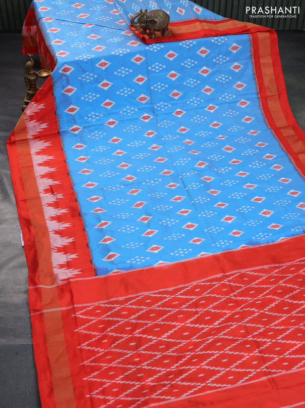 Pochampally silk saree light blue and orange with ikat butta weaves and ikat style zari woven border