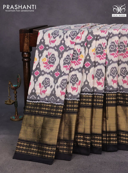 Pochampally silk saree cream and black with allover ikat weaves and long zari woven border